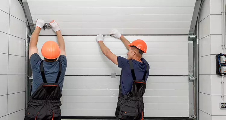 Garage Door Bottom Panel Repair in Palm River-Clair Mel, FL